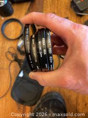 MaxSold Auction: Canon AE-1 Program & Minolta Maxxum XTsi PLUS Film SLR Kit - Hamilton (Ontario, Canada) SELLER MANAGED Estate Sale Online Auction -  John Street North