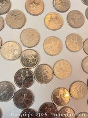 MaxSold Auction: Lot of 51–100 Canadian 25 Cent Coins (1973 RCMP) - Hamilton (Ontario, Canada) SELLER MANAGED Estate Sale Online Auction -  John Street North