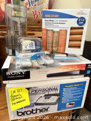 MaxSold Auction: Mixed Electronics Lot: Sony DVD, Brother Fax, Coin Sorter, More - Aurora (Colorado, USA) PARTNER MANAGED Estate Sale Online Auction - South Danube Circle