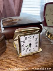 MaxSold Auction: Vintage Decorative Globe, Table Clocks, Napkin Holder & Boxes - Aurora (Colorado, USA) PARTNER MANAGED Estate Sale Online Auction - South Danube Circle
