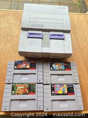 MaxSold Auction: Nintendo Super Nintendo Entertainment System (SNES) with 4 Games - Toronto (Ontario, Canada) SELLER MANAGED Downsizing Online Auction - Rutherford Avenue
