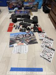 MaxSold Auction: Carrera GO!!! 1:43 Slot Car Track Bundle with Cars & Accessories - Oakville (Ontario, Canada) SELLER MANAGED Moving Online Auction - Hayhurst