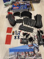 MaxSold Auction: Carrera GO!!! 1:43 Slot Car Track Bundle with Cars & Accessories - Oakville (Ontario, Canada) SELLER MANAGED Moving Online Auction - Hayhurst