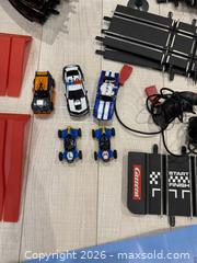 MaxSold Auction: Carrera GO!!! 1:43 Slot Car Track Bundle with Cars & Accessories - Oakville (Ontario, Canada) SELLER MANAGED Moving Online Auction - Hayhurst