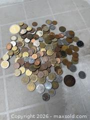 MaxSold Auction:  NICE LOT 0F FOREIGN MONEY &  TOKENS. - Hamilton (Ontario, Canada) SELLER MANAGED Estate Sale Online Auction - St. Clair Avenue
