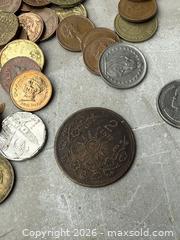 MaxSold Auction:  NICE LOT 0F FOREIGN MONEY &  TOKENS. - Hamilton (Ontario, Canada) SELLER MANAGED Estate Sale Online Auction - St. Clair Avenue