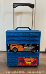 MaxSold Auction: Vintage 1990s Hot Wheels Plastic Car Storage Case with Handle and Rolling Wheels; Variety of Cars  - Kitchener (Ontario, Canada) SELLER MANAGED Downsizing Online Auction - Ahrens Street West