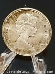MaxSold Auction: Canadian Silver Dollars - 1963 and 1967 - Aurora (Ontario, Canada) PARTNER MANAGED Downsizing Online Auction - Murray Drive