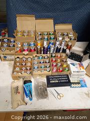 MaxSold Auction: Embroidery thread bobbins and stitch eraser - Le Roy (New York, USA) SELLER MANAGED Downsizing Online Auction - East Main Road