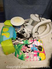 MaxSold Auction: Pool pump and floaties - Le Roy (New York, USA) SELLER MANAGED Downsizing Online Auction - East Main Road