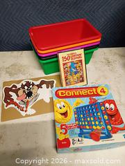 MaxSold Auction: Toy containers cartoons and a game - Le Roy (New York, USA) SELLER MANAGED Downsizing Online Auction - East Main Road