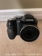 MaxSold Auction: Fujifilm FinePix S2000HD Bridge Camera 10MP 15x Zoom Black with case - Burlington (Ontario, Canada) SELLER MANAGED Downsizing Online Auction -  Taylor Crescent