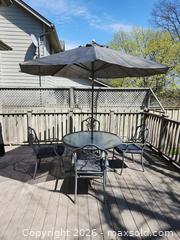 MaxSold Auction: Patio Table, Chairs and Umbrella. C - London (Ontario, Canada) SELLER MANAGED Estate Sale Online Auction - Shore Road