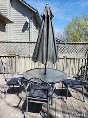 MaxSold Auction: Patio Table, Chairs and Umbrella. C - London (Ontario, Canada) SELLER MANAGED Estate Sale Online Auction - Shore Road