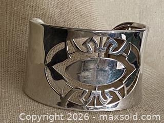 MaxSold Auction: MCM Sterling Silver Open Work Wide Cuff Bracelet with Ruby Accent - 52.4g - Toronto (Ontario, Canada) SELLER MANAGED Downsizing Online Auction - O'connor Drive (CONDO)