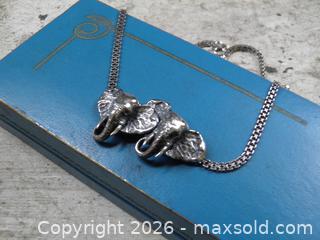MaxSold Auction: Chunky STERLING Elephant duo in BIRKS Box - Victoria (British Columbia, Canada) SELLER MANAGED Downsizing Online Auction - Gorge Road. East (CONDO)