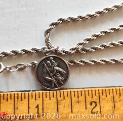MaxSold Auction: Long thick sterling chain with St Christopher sterling pendant - Victoria (British Columbia, Canada) SELLER MANAGED Downsizing Online Auction - Gorge Road. East (CONDO)