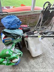 MaxSold Auction: Troy-Bilt 21 in Gas Push Lawn Mower, 2 tarps, and garden supplies for fertilizer spreader - Wilmington (Delaware, USA) SELLER MANAGED Estate Sale Online Auction - Maclary Drive