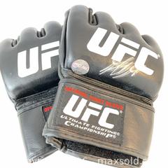 MaxSold Auction: UFC Autographed MMA Fight Gloves - Georges St. Pierre, X-Large - Aurora (Ontario, Canada) SELLER MANAGED Downsizing Online Auction -  Kane Crescent