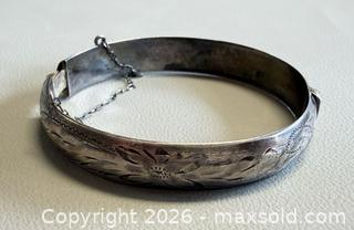 MaxSold Auction: Vintage Floral Etched Burkhardt BIRKS Sterling Silver Bangle with Safety Chain - Marked  - Toronto (Ontario, Canada) PARTNER MANAGED Reseller Online Auction - Queen Street West