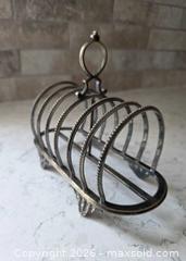 MaxSold Auction: Antique - Victorian English - Art Nouveau Silver-Plated 6-Slot Toast Rack - Kingston (Ontario, Canada) SELLER MANAGED Downsizing Online Auction - Abdo Road