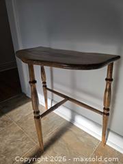 MaxSold Auction: Solid Wood Turned-Leg Side/End Table with Cross Stretcher and Beautiful Unique Design  - Size: 22.75"H x 21.5"W x 11.5"D - Kingston (Ontario, Canada) SELLER MANAGED Downsizing Online Auction - Abdo Road