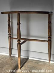 MaxSold Auction: Solid Wood Turned-Leg Side/End Table with Cross Stretcher and Beautiful Unique Design  - Size: 22.75"H x 21.5"W x 11.5"D - Kingston (Ontario, Canada) SELLER MANAGED Downsizing Online Auction - Abdo Road