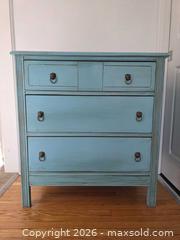 MaxSold Auction: Turquoise Solid Wood 3-Drawer Dresser with Brass Lion  -  Size: 33.75"H x 32"W x 16.25"D - Kingston (Ontario, Canada) SELLER MANAGED Downsizing Online Auction - Abdo Road