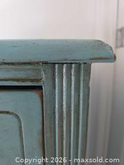 MaxSold Auction: Turquoise Solid Wood 3-Drawer Dresser with Brass Lion  -  Size: 33.75"H x 32"W x 16.25"D - Kingston (Ontario, Canada) SELLER MANAGED Downsizing Online Auction - Abdo Road