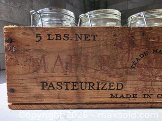 MaxSold Auction: Vintage Maple Leaf Glass Jars with Wooden Crate - Size: 12"L x 4" W x 3.75"H - Kingston (Ontario, Canada) SELLER MANAGED Downsizing Online Auction - Abdo Road
