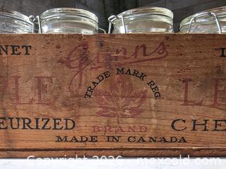MaxSold Auction: Vintage Maple Leaf Glass Jars with Wooden Crate - Size: 12"L x 4" W x 3.75"H - Kingston (Ontario, Canada) SELLER MANAGED Downsizing Online Auction - Abdo Road