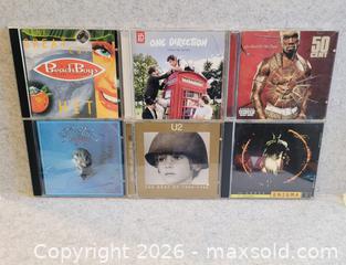 MaxSold Auction: Collectible CDs of Various Artists - Pickering (Ontario, Canada) SELLER MANAGED Reseller Online Auction - Old Brock Road