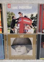 MaxSold Auction: Collectible CDs of Various Artists - Pickering (Ontario, Canada) SELLER MANAGED Reseller Online Auction - Old Brock Road