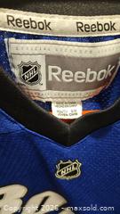 MaxSold Auction: Lightning Bolts Lecavalier Youth Jersey - Riverview (Florida, USA) SELLER MANAGED Downsizing Online Auction - Holly Heath Drive