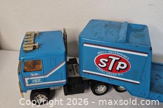 MaxSold Auction: Vtg STP Steel Richard Petty Semi Trailer - Riverview (Florida, USA) SELLER MANAGED Downsizing Online Auction - Holly Heath Drive