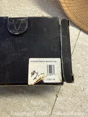 MaxSold Auction: Cowboy hats and belt buckle - North Cowichan (British Columbia, Canada) SELLER MANAGED Moving Online Auction - Maple Bay Road