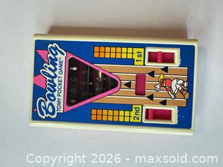 MaxSold Auction: Tomy Pocket Bowling Handheld Mechanical Toy (Pink/Blue/White) - San Jose (California, USA) PARTNER MANAGED Estate Sale Online Auction - East Humboldt Street