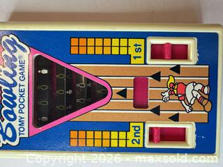 MaxSold Auction: Tomy Pocket Bowling Handheld Mechanical Toy (Pink/Blue/White) - San Jose (California, USA) PARTNER MANAGED Estate Sale Online Auction - East Humboldt Street