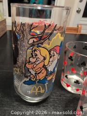 MaxSold Auction: 1960s Schwartz Mustard glasses & McDonald's Walt Disney Snow White glass  - Ottawa (Ontario, Canada) SELLER MANAGED Downsizing Online Auction - Kingsford Court