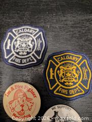MaxSold Auction: Antique brass fire extinguisher, button pins and patches  - Ottawa (Ontario, Canada) SELLER MANAGED Downsizing Online Auction - Kingsford Court