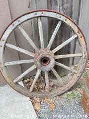 MaxSold Auction: Wagon Wheel with Milk Cans, Rustic Garden Accents - South Frontenac (Ontario, Canada) SELLER MANAGED Moving Online Auction -  Pepper Lane