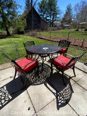 MaxSold Auction: Black Cast Aluminum Patio Dining Set With Four Chairs and Cushions - Leeds And The Thousand Islands (Ontario, Canada) PARTNER MANAGED Downsizing Online Auction - Main Street
