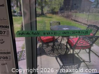 MaxSold Auction: Black Cast Aluminum Patio Dining Set With Four Chairs and Cushions - Leeds And The Thousand Islands (Ontario, Canada) PARTNER MANAGED Downsizing Online Auction - Main Street