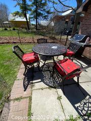 MaxSold Auction: Black Cast Aluminum Patio Dining Set With Four Chairs and Cushions - Leeds And The Thousand Islands (Ontario, Canada) PARTNER MANAGED Downsizing Online Auction - Main Street