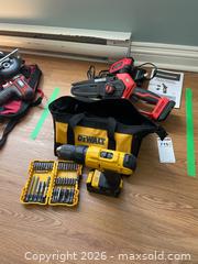 MaxSold Auction: DeWalt Cordless Drill Set with Accessories and Benchmark Pruning Chainsaw - Leeds And The Thousand Islands (Ontario, Canada) PARTNER MANAGED Downsizing Online Auction - Main Street
