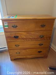 MaxSold Auction: Four-Drawer Wooden Dresser with Brass Handles - Leeds And The Thousand Islands (Ontario, Canada) PARTNER MANAGED Downsizing Online Auction - Main Street