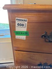 MaxSold Auction: Four-Drawer Wooden Dresser with Brass Handles - Leeds And The Thousand Islands (Ontario, Canada) PARTNER MANAGED Downsizing Online Auction - Main Street