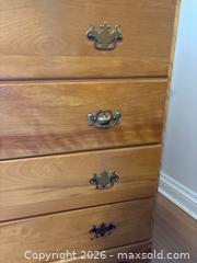 MaxSold Auction: Four-Drawer Wooden Dresser with Brass Handles - Leeds And The Thousand Islands (Ontario, Canada) PARTNER MANAGED Downsizing Online Auction - Main Street
