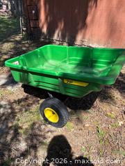 MaxSold Auction: John Deere 7P Poly Utility Trailer with 32Wx44Lx10D Bin, 64-inch Total Length - Leeds And The Thousand Islands (Ontario, Canada) PARTNER MANAGED Downsizing Online Auction - Main Street