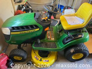 MaxSold Auction: John Deere E120 20 HP Riding Lawn Tractor with Operator's Manual - Leeds And The Thousand Islands (Ontario, Canada) PARTNER MANAGED Downsizing Online Auction - Main Street